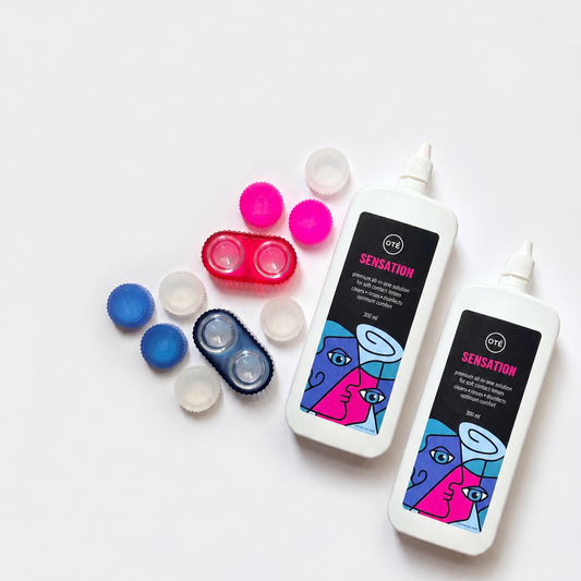 2 bottles of OTE contact lens solution and two JADE contact lens cases, one in pink, one in blue. 