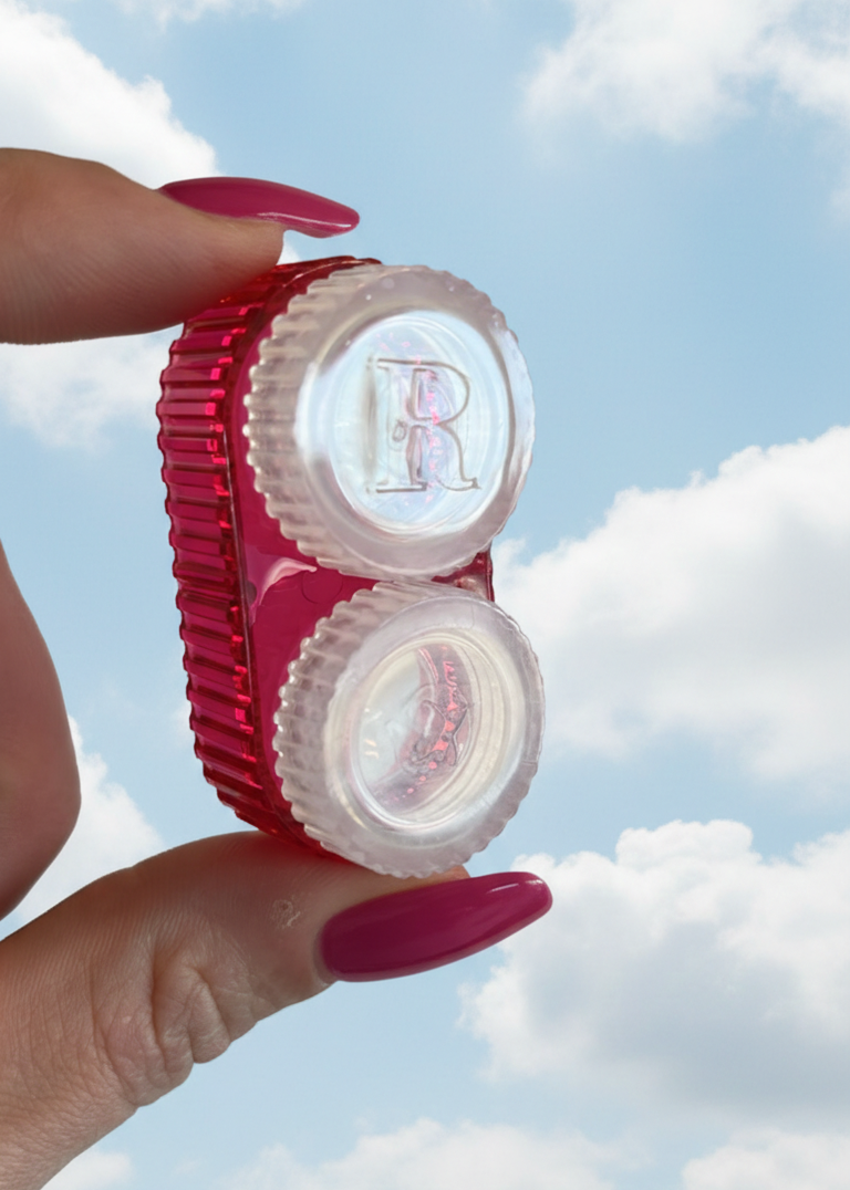 Holding a jade case up to the sky