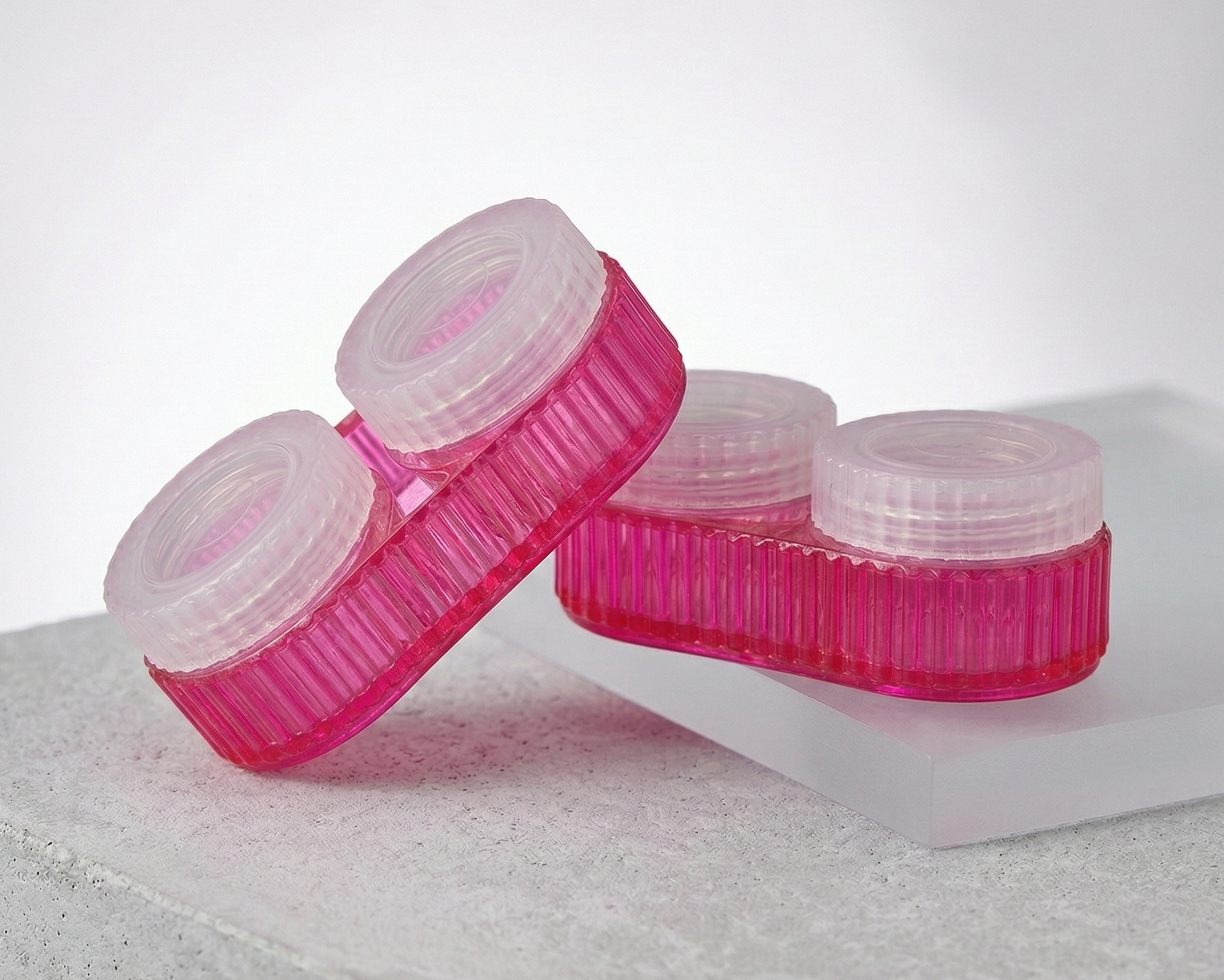 2 pink contact lens cases
